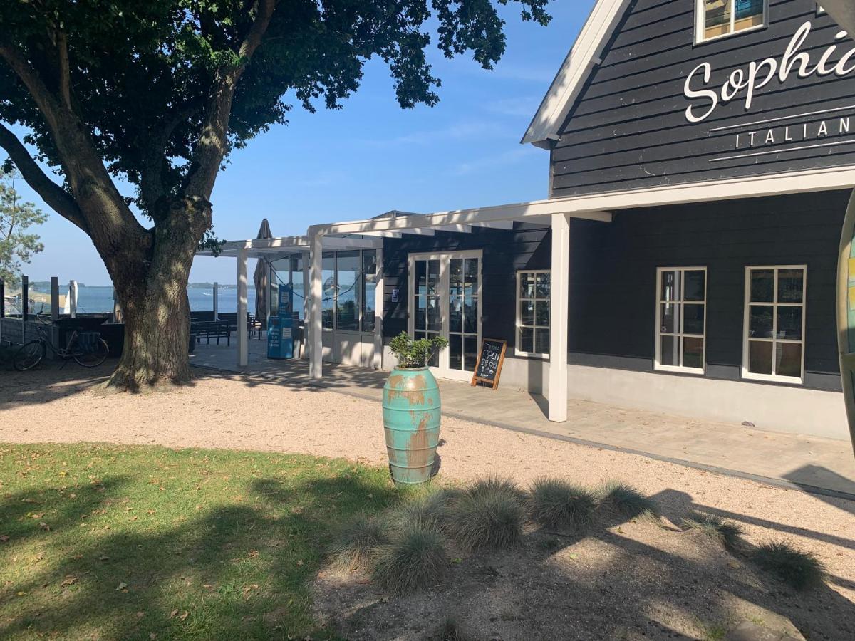 Green Villa In Bester Lage - Dachterrasse Mit Meerblick - Grosser Eingezaeunter Garten - Kinderfreundlich - Hunde Inklusive - 4 Sterne Resort - Direkt Am Strand - Pool Inklusive هولْسْهورست المظهر الخارجي الصورة
